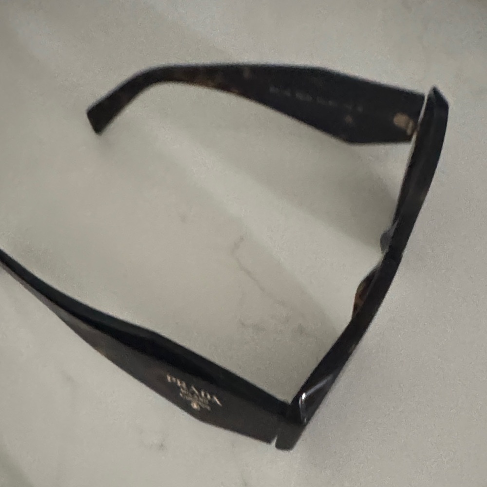 Prada Black Women's Sunglasses with Gold Logo Accent